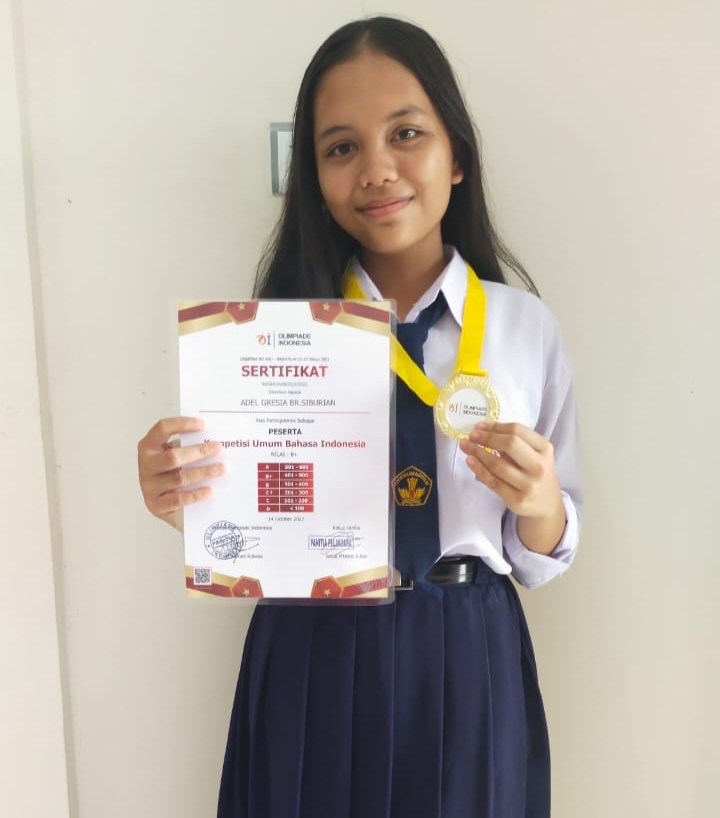 Edel Gresia Br Siburian, Siswa SMP Negeri Tapung Raih Mendali Emas Di Ajang Olimpiade Bahasa Indonesia